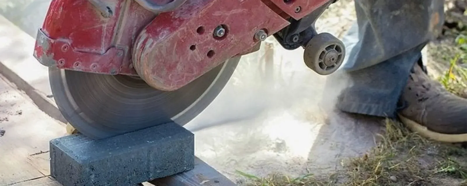 Concrete saw cutting a slab to reach a leaking pipe